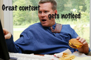 A man neglects his lunch to read something interesting on a website